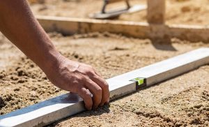 zand egaliseren voor bestrating